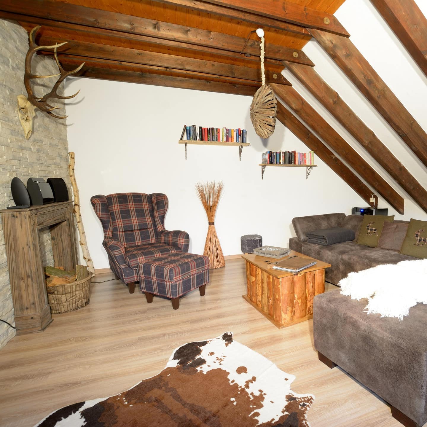 Gemütliche Ferienwohnung am Wurmberg in Braunlage mit Holzbalken, Kamin und Sofa-Sitzecke