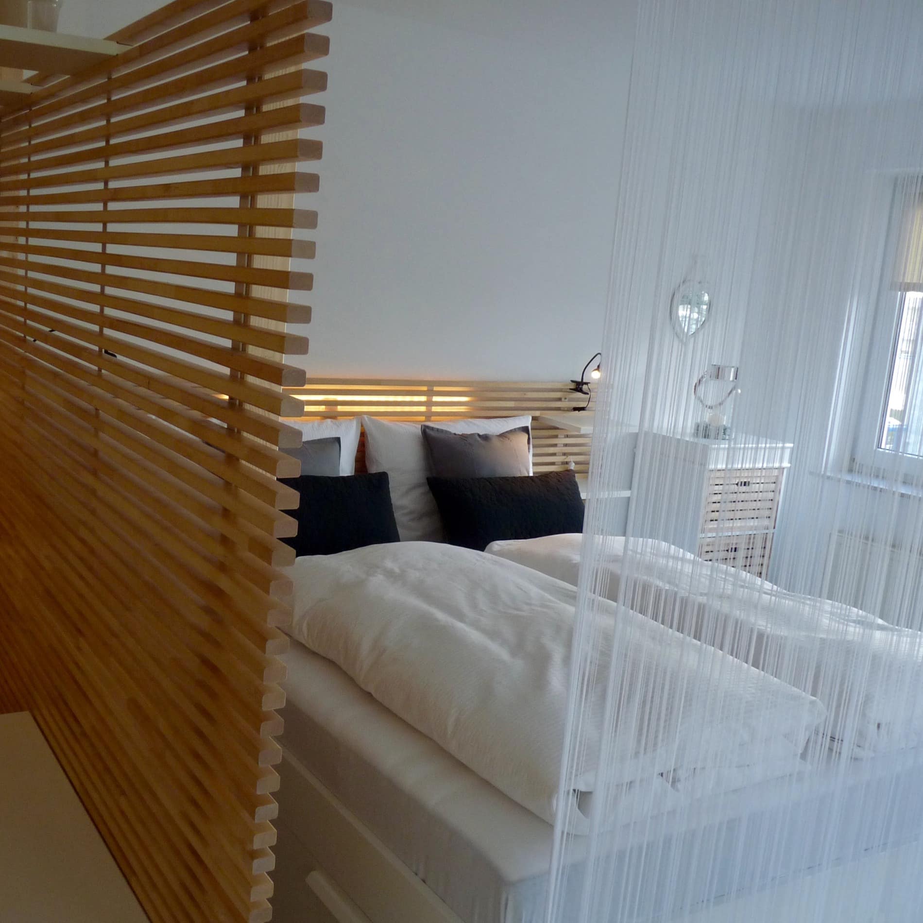 Schlafzimmer einer Ferienwohnung in Scharbeutz an der Ostsee